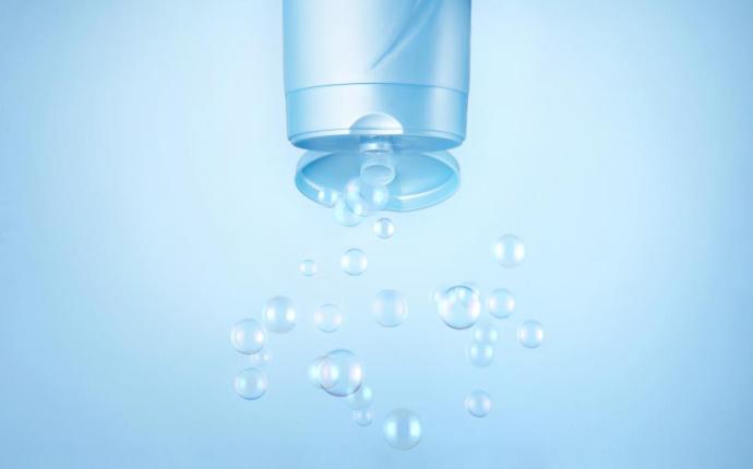 Bubbles coming out of a shampoo bottle
